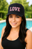 LOVE COLLEGIATE EMBROIDERED TRUCKER HAT (Black w/ Pink)
