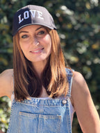 LOVE COLLEGIATE EMBROIDERED TRUCKER HAT (Black w/ White)