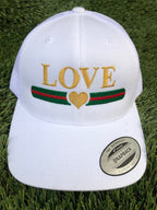 LOVE STRIPE GOLD HEART EMBROIDERED TRUCKER HAT (White)
