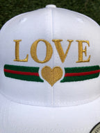 LOVE STRIPE GOLD HEART EMBROIDERED TRUCKER HAT (White)