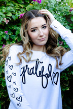 GRATEFUL HEART L/S FLEECE PULLOVER with  HEARTS on Arm (White)