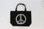 PEACE SIGN SPLATTER BLACK CANVAS TOTE.